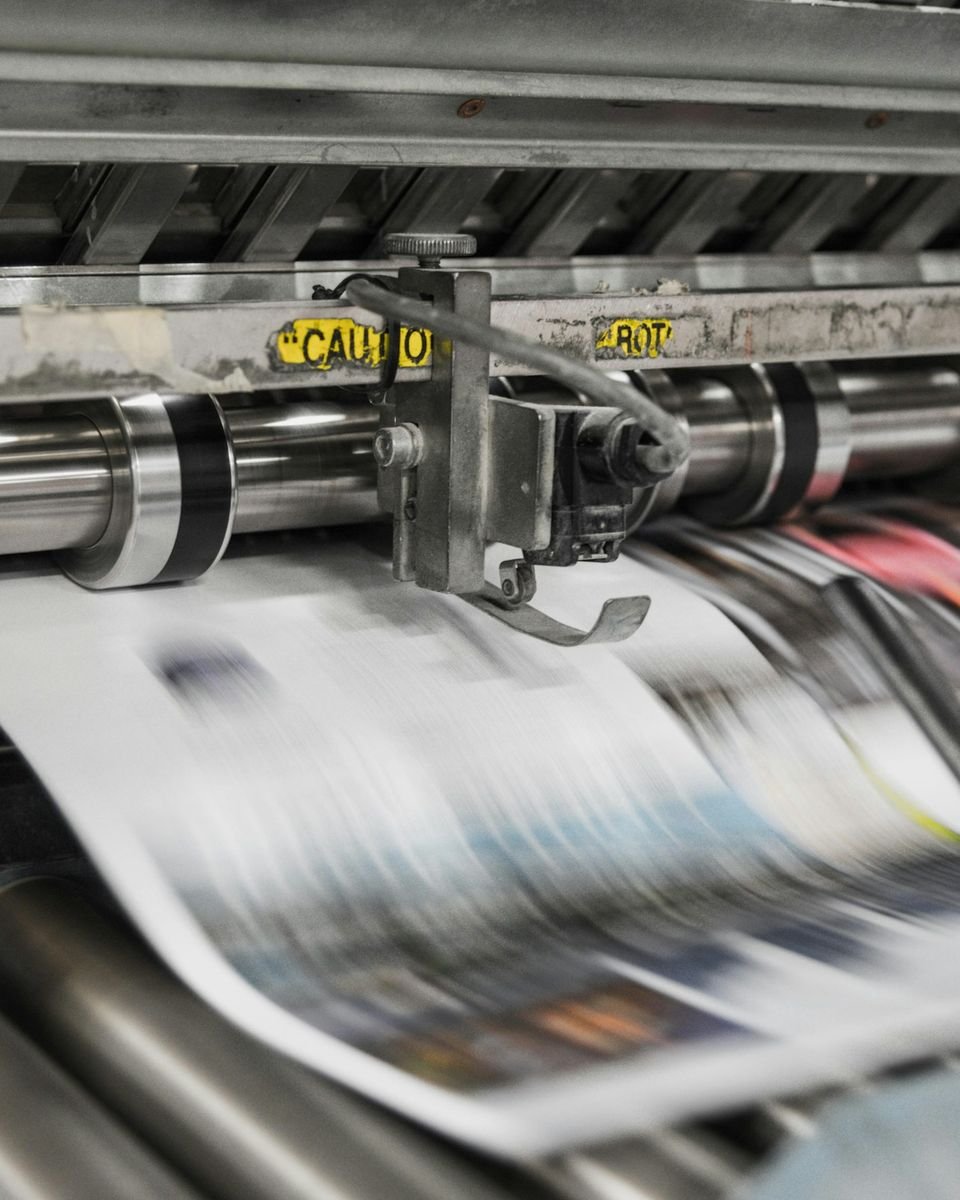 A printing press running the day&rsquo;s newspapers