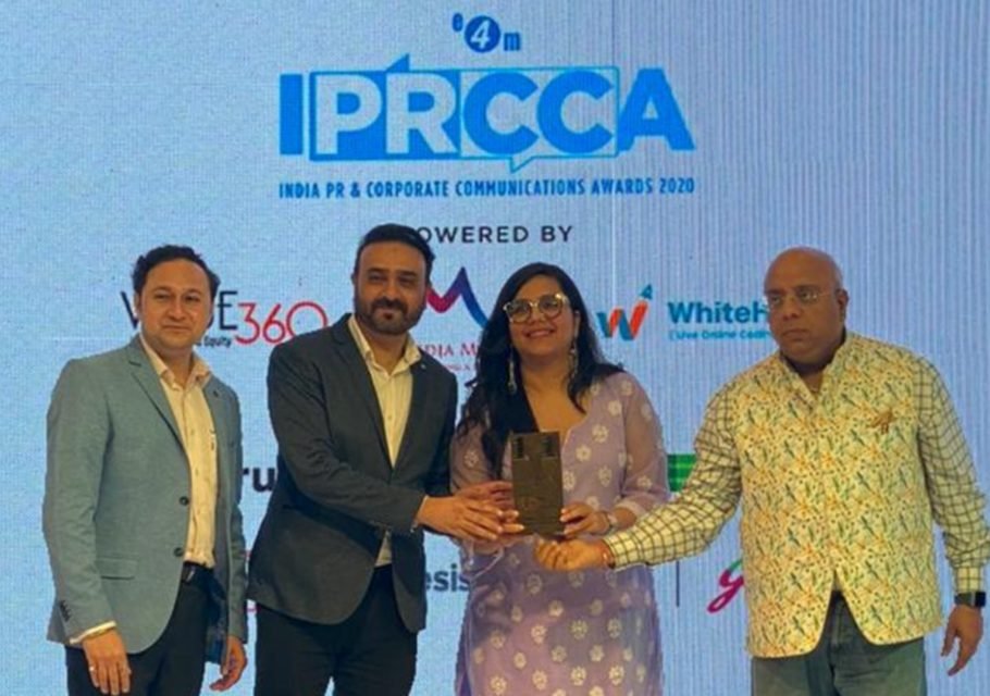 Commwiser receiving its award on stage at the India PR and Corporate Communications Awards 2020